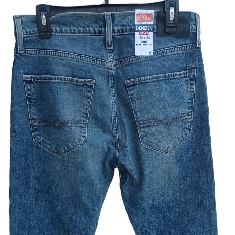 532428.....Denizen Levis Slim Tapered Fit Jeans Size 32X34