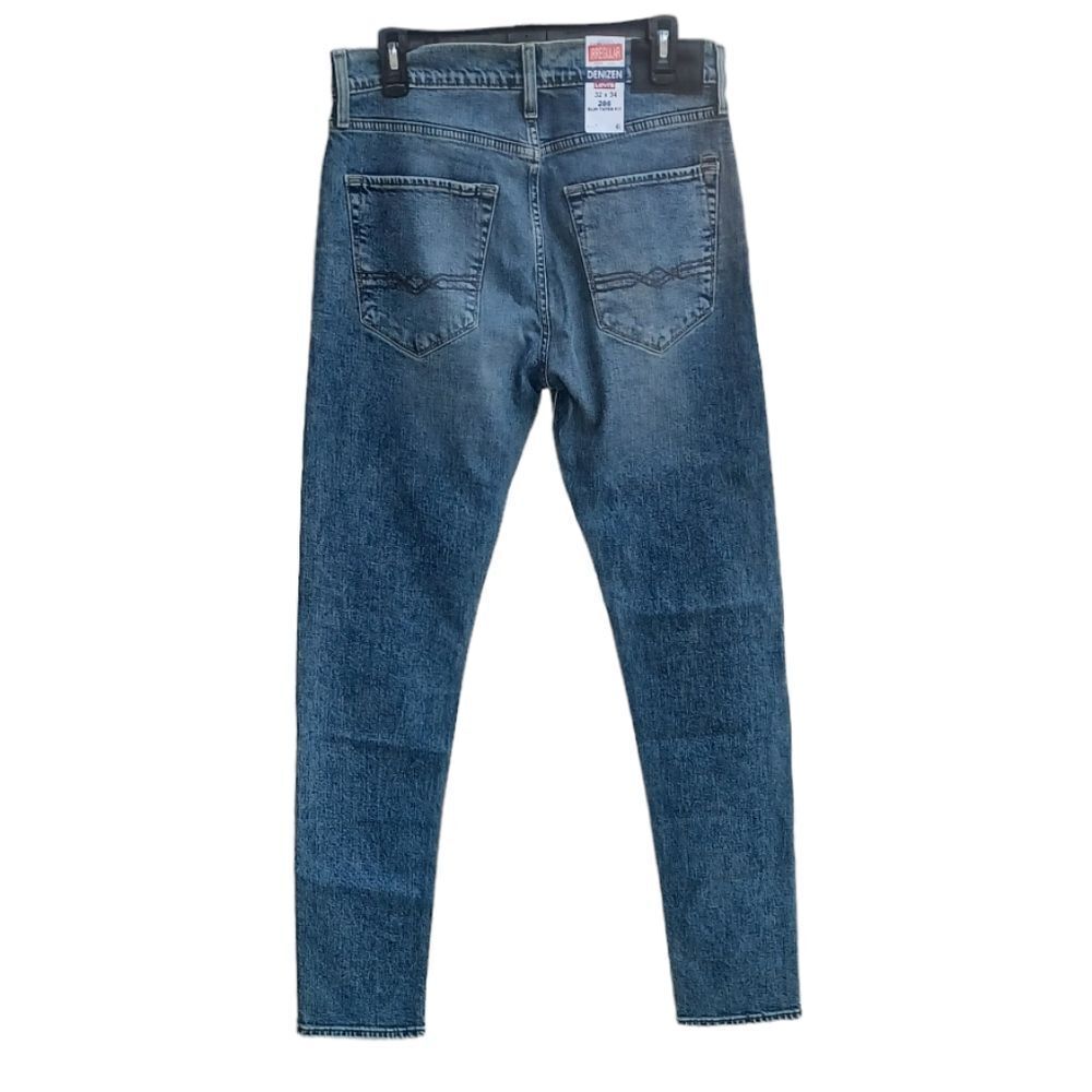 532428.....Denizen Levis Slim Tapered Fit Jeans Size 32X34