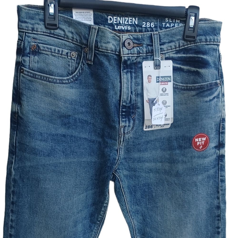 532428.....Denizen Levis Slim Tapered Fit Jeans Size 32X34