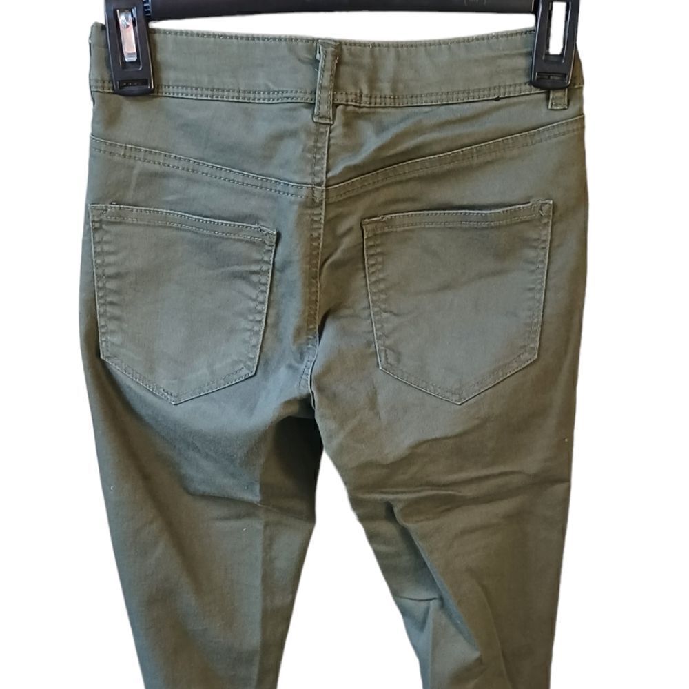 680225....Girls Divided Green Skinny Jeans Size 4, W24"  28"Inseam  7"Rise
