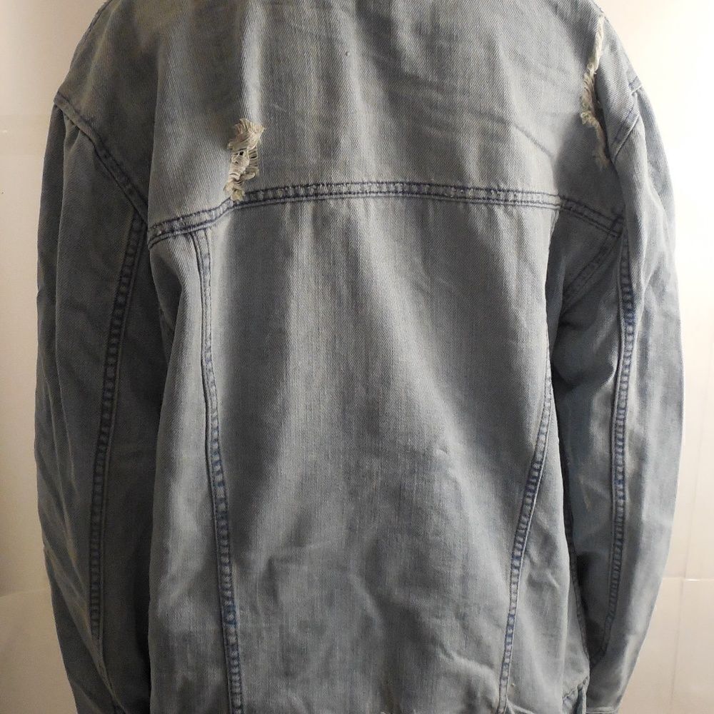 NWT Light Wash Distressed Shredded Jean Jacket