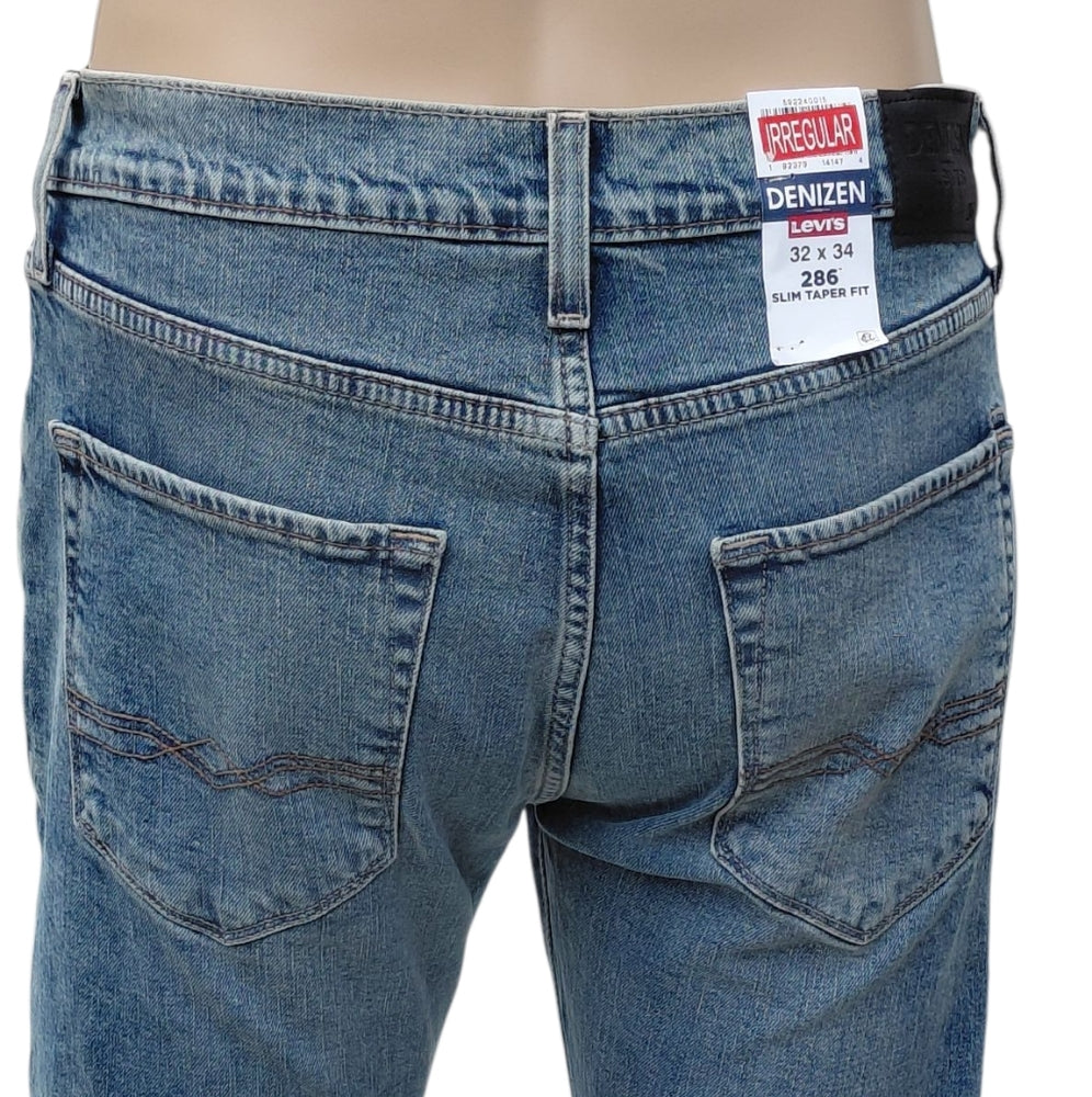 532428.....Denizen Levis Slim Tapered Fit Jeans Size 32X34