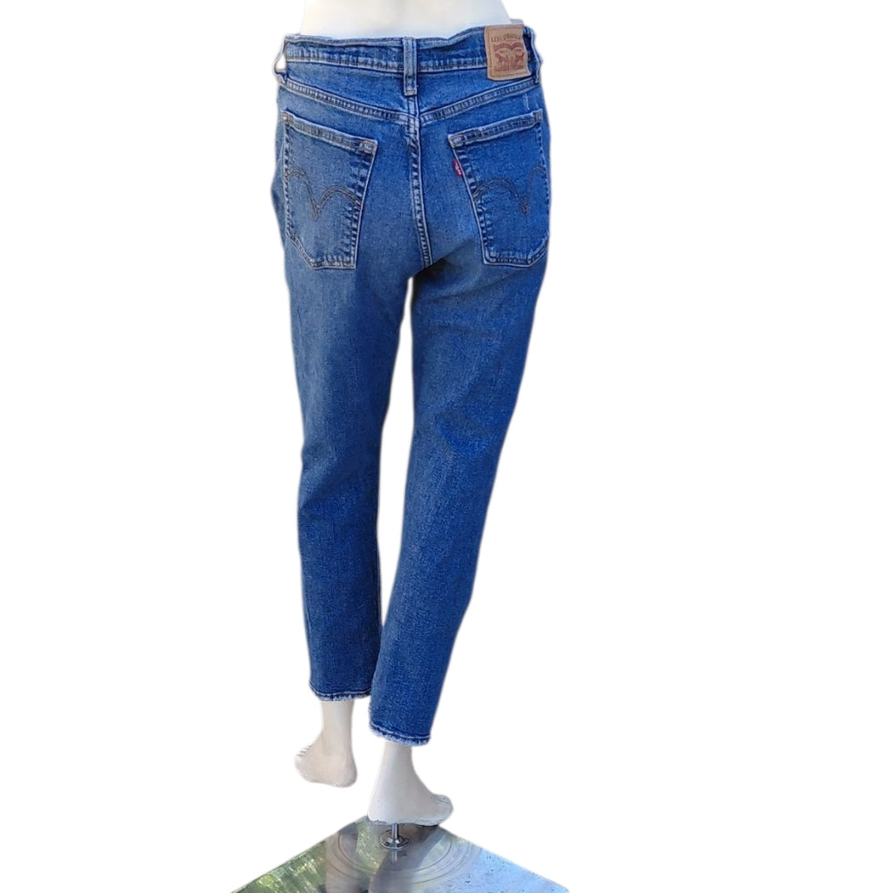 8263.....Levi Wedgie Straight Leg Jeans Size 30