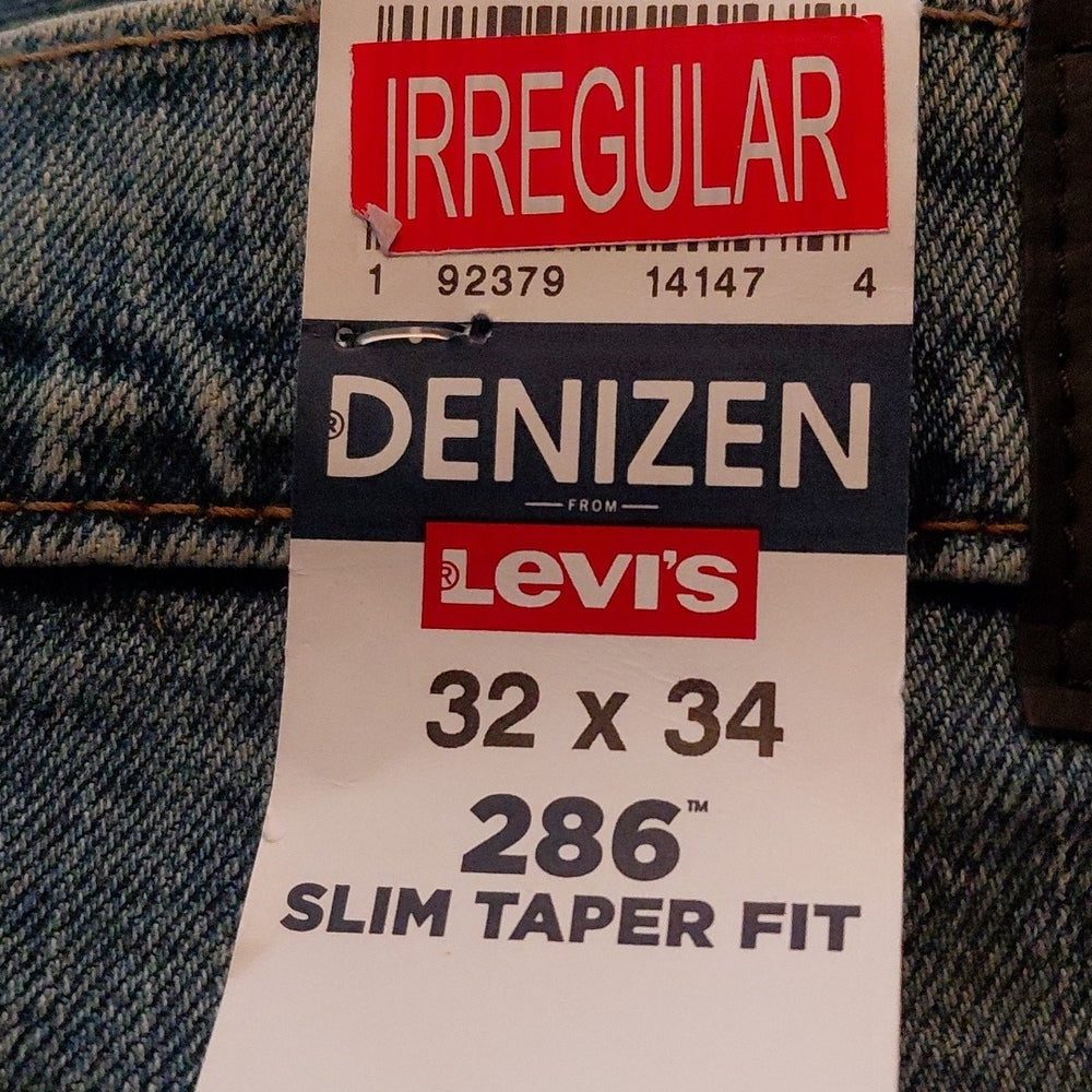532428.....Denizen Levis Slim Tapered Fit Jeans Size 32X34